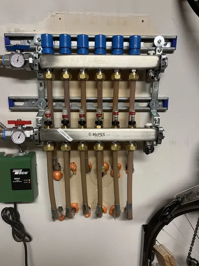 Plumber performing Water Heater Repair at a residential property in Inverness Highlands South